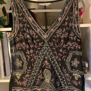 The most stunning embellished sheer vest